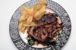 Blackened Pork Chops on a Mango Salsa with Plantain Crisps