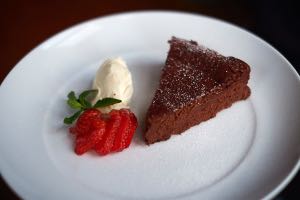 Flourless Chocolate Whisky Cake, served with creme fraiche