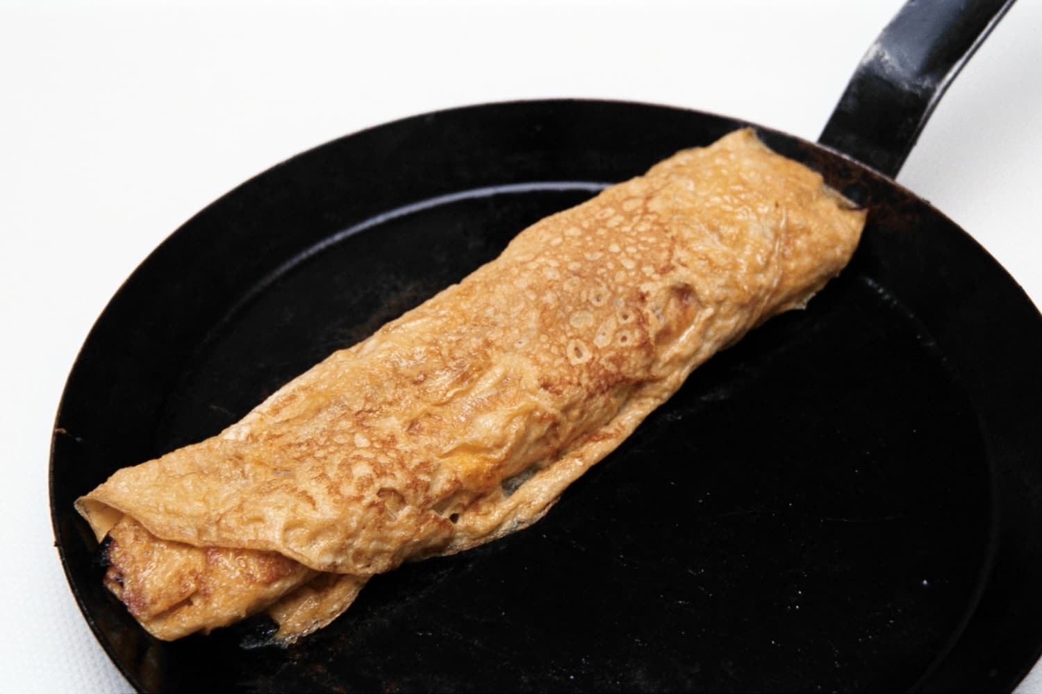 Rolled Sweet Omlettes (Tamago Yaki) rolled in the pan