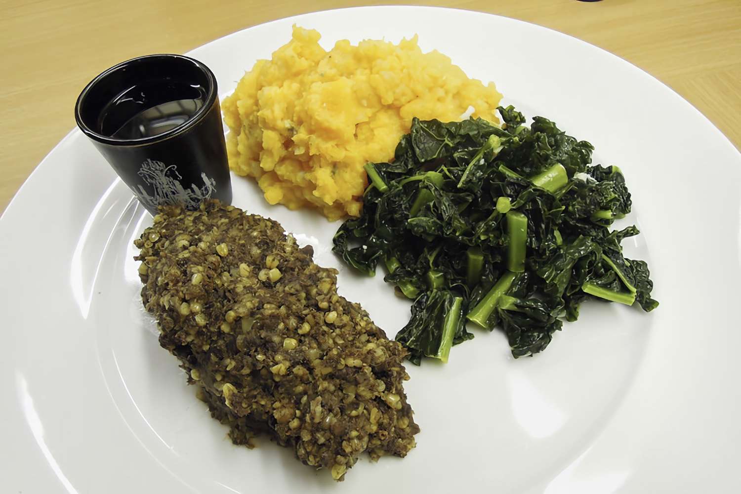 Haggis, Neeps and tatties with a shot of whiskey