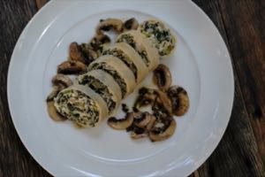 Swiss Chard Pasta Roll, served with pan fried mushrooms