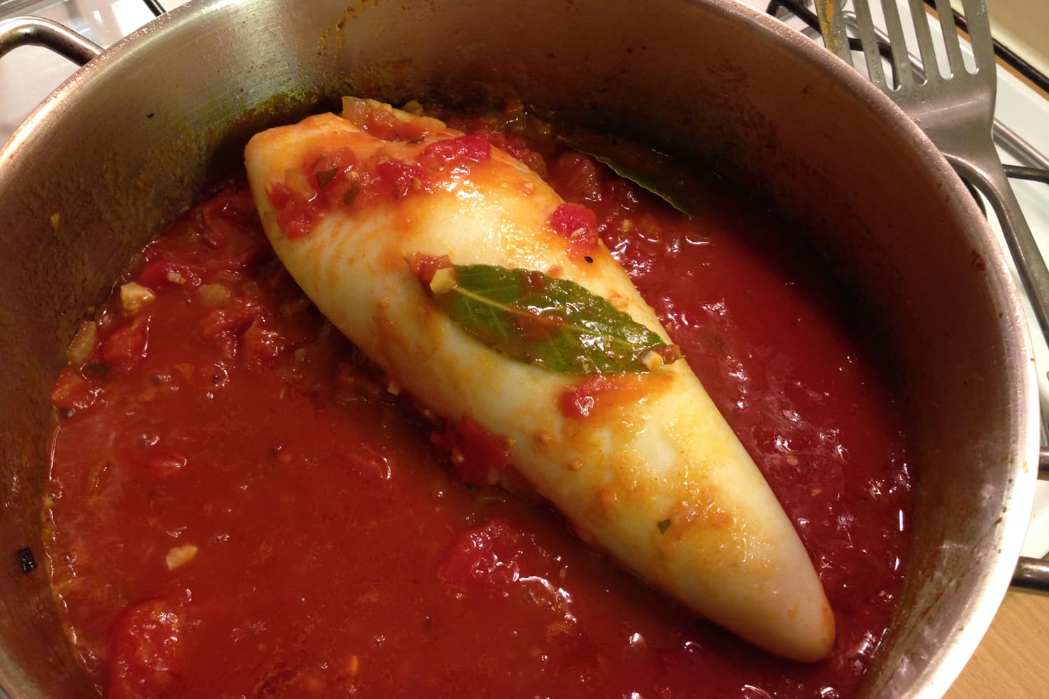 Chorizo Stuffed Squid cooking.