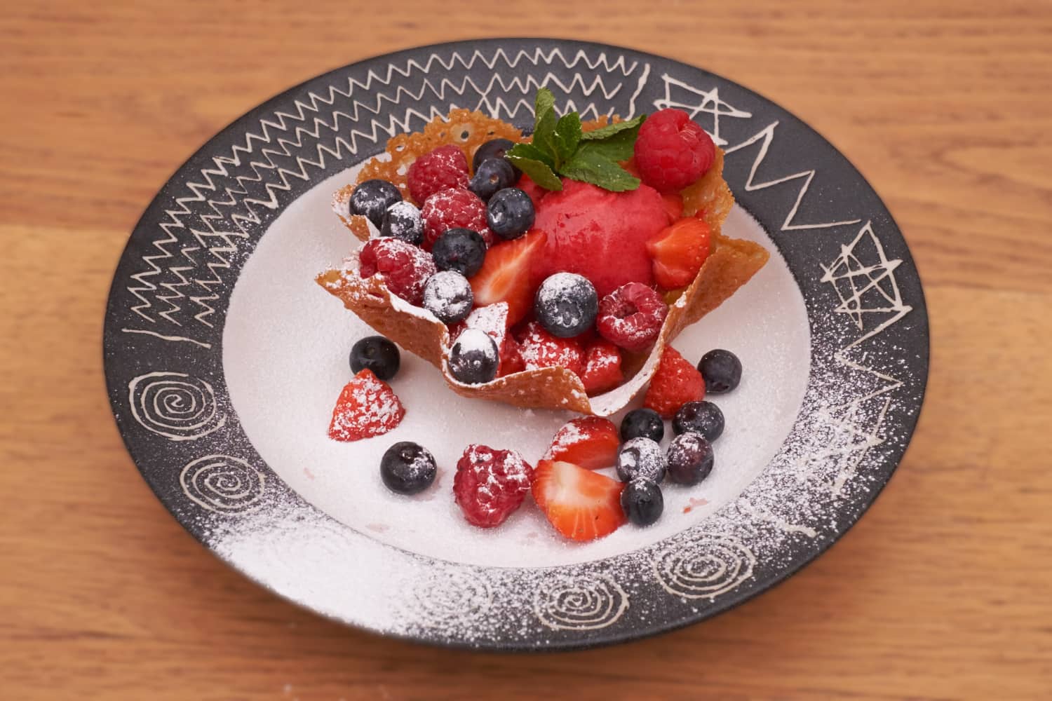 Brandy Snap Baskets with Raspberry Sorbet and berries